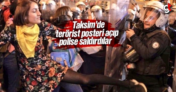 Taksim'de terörist posteri açıp polise saldırdılar