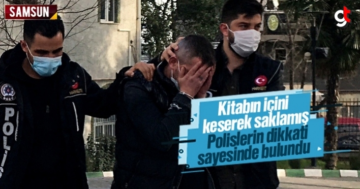 Kitabın içini keserek saklamış